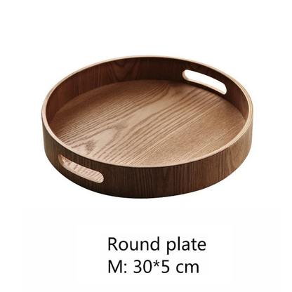 Slim, round serving trays made of wood